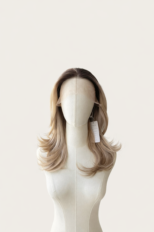 shoulder length blonde with dark roots